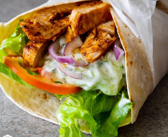 Chicken Wrap/ 2 Sides*.